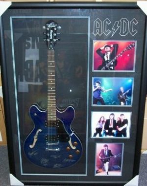 ACDC signed and framed guitar
