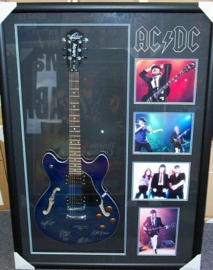 ACDC signed and framed guitar - Pro Sports Memorabilia